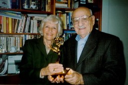 Aron and Lisa with the Emmy they won for their 1997 documentary, A Journey of Remembrance. Photograph taken in Northbrook, Illinois, 1998.