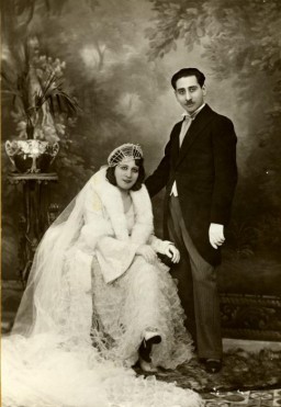 Prewar wedding portrait of Reine and Yishua Ghozlan in Constantine, Algeria, on March 29, 1932.
The couple experienced antisemitism in the prewar years, and in 1933 Reine and Yishua survived a deadly pogrom by hiding with French Christian friends. After the start of World War II, Yishua was thrown out of his position in the post office. Reine, Yishua, and their children were evicted from their apartment.