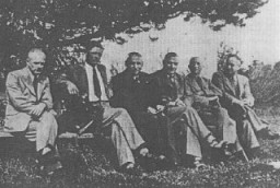Personnel of T4, the agency created to administer the Nazi Euthanasia Program. Pictured from left to right are: Erich Bauer (chauffeur), Dr. Rudolf Lonauer, Dr. Victor Ratka, Dr. Friedrich Mennecke, Dr. Paul Nitsche,and Dr. Gerhard Wischer. Berlin, Germany, 1939–45.