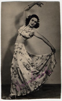 Theresia Seibel, born in 1921, was a member of the Sinti froup (Sinti and Roma are two main groups that make up the Romani, or Gypsy, ethnic minority). 
Theresia joined Germany’s Wuerzburg Stadttheater at age 16, performing as a singer and dancer. In 1941, she defied Gestapo orders to be sterilized and was three months pregnant with twins by the time she was called in for the procedure. She was allowed to continue the pregnancy on the condition that the babies would be given at birth to the clinic at the University of Wuerzburg, where Dr. Werner Heyde conducted research on twins. She later found one of the twins, Rolanda, lying dead in the clinic with a bandaged head, the victim of experiments with eye coloration. She grabbed the surviving twin, Rita, who was soon captured and returned to the clinic. Both mother and daughter survived the war and moved to the United States, before returning to Germany to run a Sinti human rights organization that sought to raise consciousness about the fate of Roma (Gypsies) during the Holocaust. 