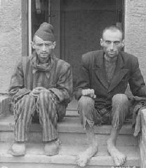 Two survivors of the Dora-Mittelbau concentration camp, located near Nordhausen. Germany, April 14, 1945.