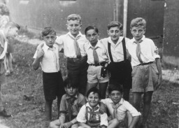 Elementary school-age members of Hashomer Hatzair in the Stuttgart displaced persons camp, circa 1946–1949. Lova Warszawczyk is standing in the center.