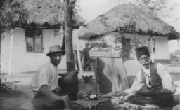 Two Romani (Gypsy) artisans. Ploesti, Romania, 1930s.