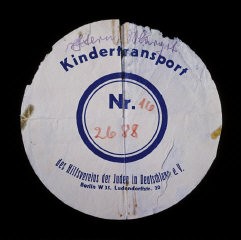 Circular label from the suitcase used by Margot Stern when she was sent on a Kindertransport to England. Germany, December 1938.