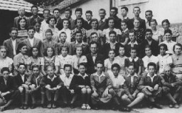 Group portrait of students and teachers at the Hebrew gymnasium in Munkacs. 1936-1937.