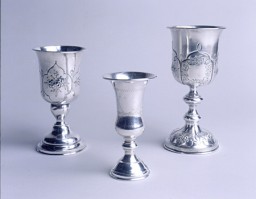 Goblets used in Shanghai by the Caspary family for blessings (Kiddush) over wine on the Sabbath or Jewish holidays. The Orthodox Casparys ran a kosher restaurant frequented by yeshiva students from Poland. [From the USHMM special exhibition Flight and Rescue.]