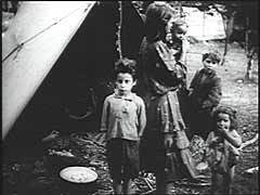 Germany and its Axis allies invaded Yugoslavia in April 1941. The Germans probably shot this film after they occupied southern Slovenia following the Italian armistice in 1943. The film was found in the Ustasa (Croatian fascist) archives after World War II and shows the dismal living conditions that Roma (Gypsies) endured in occupied northern Yugoslavia.