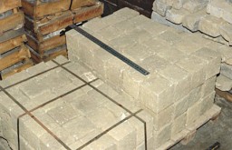 This photograph shows some of the 190 granite blocks donated to the United States Holocaust Memorial Museum by the Mauthausen Public Memorial in Austria. The Nazis established the Mauthausen concentration camp in 1938 near an abandoned stone quarry. Prisoners were forced to carry these granite blocks up more than 180 steps. The small blocks weighed between 30 and 45 pounds each. The larger blocks could each weigh more than 75 pounds. Prisoners assigned to forced labor in the camp quarry were quickly worked to death.