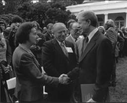 Vladka and Benjamin Meed (center) with President Jimmy Carter at a White House Rose Garden ceremony marking the official presentation of the report of the US Holocaust Commission to the president by commission chairman Elie Wiesel. Washington, DC, September 27, 1979.