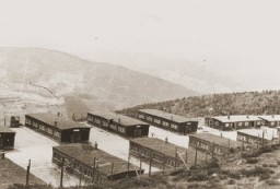 View of buildings in the Natzweiler concentration camp. Beginning in the summer of 1943, the Germans detained many "Night and Fog" prisoners in Natzweiler-Struthof. This photograph was taken following the liberation of the camp. Natzweiler-Struthof, France, 1945.
