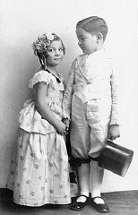 Alice and Heinrich Muller pose for a photograph while in costume for the Purim holiday. Hlohovec, Czechoslovakia, ca. 1934–35.