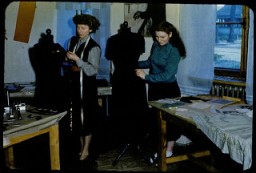Jewish displaced persons learn dressmaking in the Foehrenwald Organization for Rehabilitation through Training (ORT) vocational school. Foehrenwald was the final displaced persons camp to close, functioning until 1957 as a home for Jews who had no place to go. Foehrenwald, Germany, 1953.