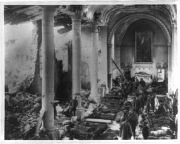 A US army field hospital inside the ruins of a church in France during World War I. France, 1918