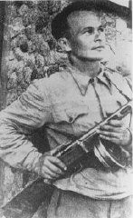 Yiddish writer and cultural activist Shmerke Kaczerginski, who joined Jewish partisans in the Vilna area. 1944–1945.
