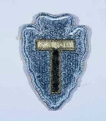 Insignia of the 36th Infantry Division. The 36th Infantry Division, the "Texas" division, was raised from National Guard units from Texas and Oklahoma during World War I. The "T" in the division's insignia represents Texas, the arrowhead Oklahoma. The division was also sometimes called the "Lone Star" division, again symbolizing its Texas roots.