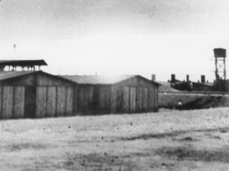 View of the Trawniki training camp showing two barracks and a watch tower. Trawniki, Poland, between 1941 and 1944. 