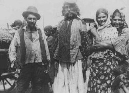 Roma (Gypsies) near Uzhgorod in 1938, including the group's chief (standing second from left).