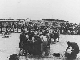 After liberation by US troops, former prisoners wait in line for soup at the Gusen camp, a subcamp of Mauthausen concentration camp. Gusen, Austria, May 12, 1945.