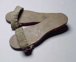 Wooden sandals worn by a member of the Mir Yeshiva in Shanghai. [From the USHMM special exhibition Flight and Rescue.]