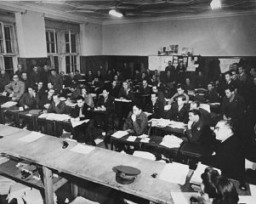 The press room at the International Military Tribunal. Nuremberg, Germany, between November 1945 and October 1946.