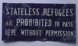 One of many signs displayed along the Shanghai ghetto's boundaries: "Stateless Refugees are Prohibited to Pass Here without Permission". This plaque was removed by a refugee at the end of the war. [From the USHMM special exhibition Flight and Rescue.]