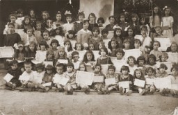 Group portrait of children holding their diplomas at a school in Bitola. Between 1925 and 1938.