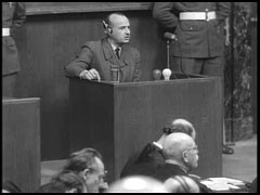 Defendant Hans Frank gives testimony to his defense lawyer during the Nuremberg trial about his leadership roles during the Third Reich.