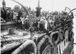 Passengers on the deck of the refugee ship Exodus 1947 in Haifa. British forces returned them to displaced persons camps in Germany, dramatizing the plight of Holocaust survivors attempting to enter Palestine. Haifa, Palestine, July 18, 1947.
