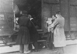 Deportation from the Westerbork transit camp. Members of the Jewish police are seen in the photograph. The Netherlands, 1943–44.