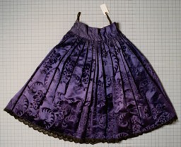 This taffeta and cotton skirt dates from the 1920s. It belonged to a Romani (Gypsy) woman who was born in Frankfurt, Germany, and who lived in Germany before the war. She was arrested by the Nazis and interned in the Auschwitz, Ravensbrück, Mauthausen, and Bergen-Belsen camps. She died in Bergen-Belsen in March 1945, shortly before the camp's liberation. Her husband and two of her six children were also killed in the camps.