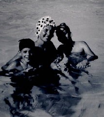 Regina with sons Harry and Paul in a swimming pool. August 1968.