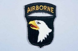 Insignia of the 101st Airborne Division. The nickname of the 101st Airborne Division, "Screaming Eagles," originates from the division's insignia, a bald eagle on a black shield. "Old Abe" was the eagle mascot of a Wisconsin regiment during the Civil War. The 101st was formed as a reserve unit in Wisconsin shortly after World War I and included "Old Abe" as part of the division's insignia.