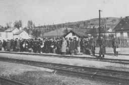 Jews at the railroad station before deportation. Puchov, Czechoslovakia, March 1942. (Source record ID: E39 Nr.2447/8)