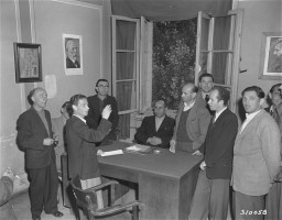 Leaders at the Wetzlar displaced persons (DP) camp hold a meeting to discuss current happenings and improvements for the camp, September 9, 1948.