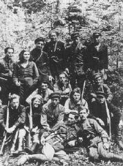 Group portrait of a Jewish partisan unit operating in the Lithuanian forests. Many of its members had been involved in resistance activities in the Kovno ghetto. Lithuania, 1944.