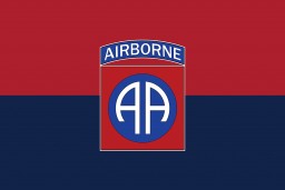 A digital representation of the United States 82nd Airborne Division's flag. 
The US 82nd Airborne Division (the "All American" division) was established in 1918 and fought in World War I. During World War II, they were involved in D-Day and Battle of the Bulge. The division also overran Wöbbelin, a subcamp of Neuengamme. The 82nd Airborne Division was recognized as a liberating unit in 1991 by the United States Army Center of Military History and the United States Holocaust Memorial Museum (USHMM). 