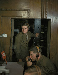 Translators operate an IBM machine during a session of the International Military Tribunal.